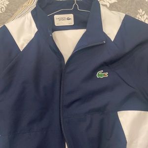 Lacost tracksuit brand new never been worn with tags on it got it a gift